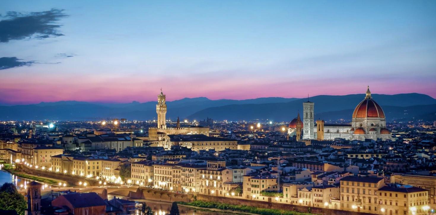Florence skyline at dusk with Palazzo Vecchio and the Duomo