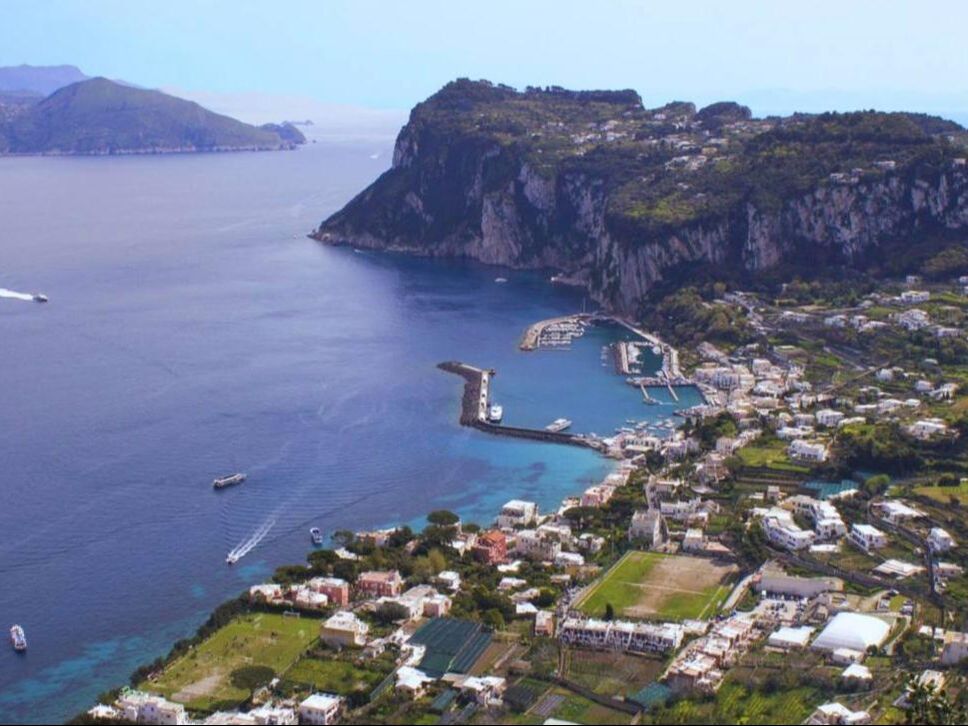 Ferries crossing the Bay of Naples to Capri's Marina Grande harbour