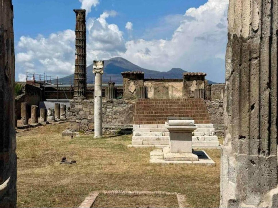 Temple of Apollo in Pompeii with Mount Vesuvius in the background