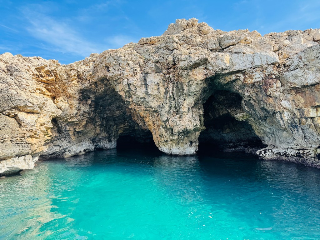 Turquoise sea and limestone cliffs at Polignano a Mare, Puglia