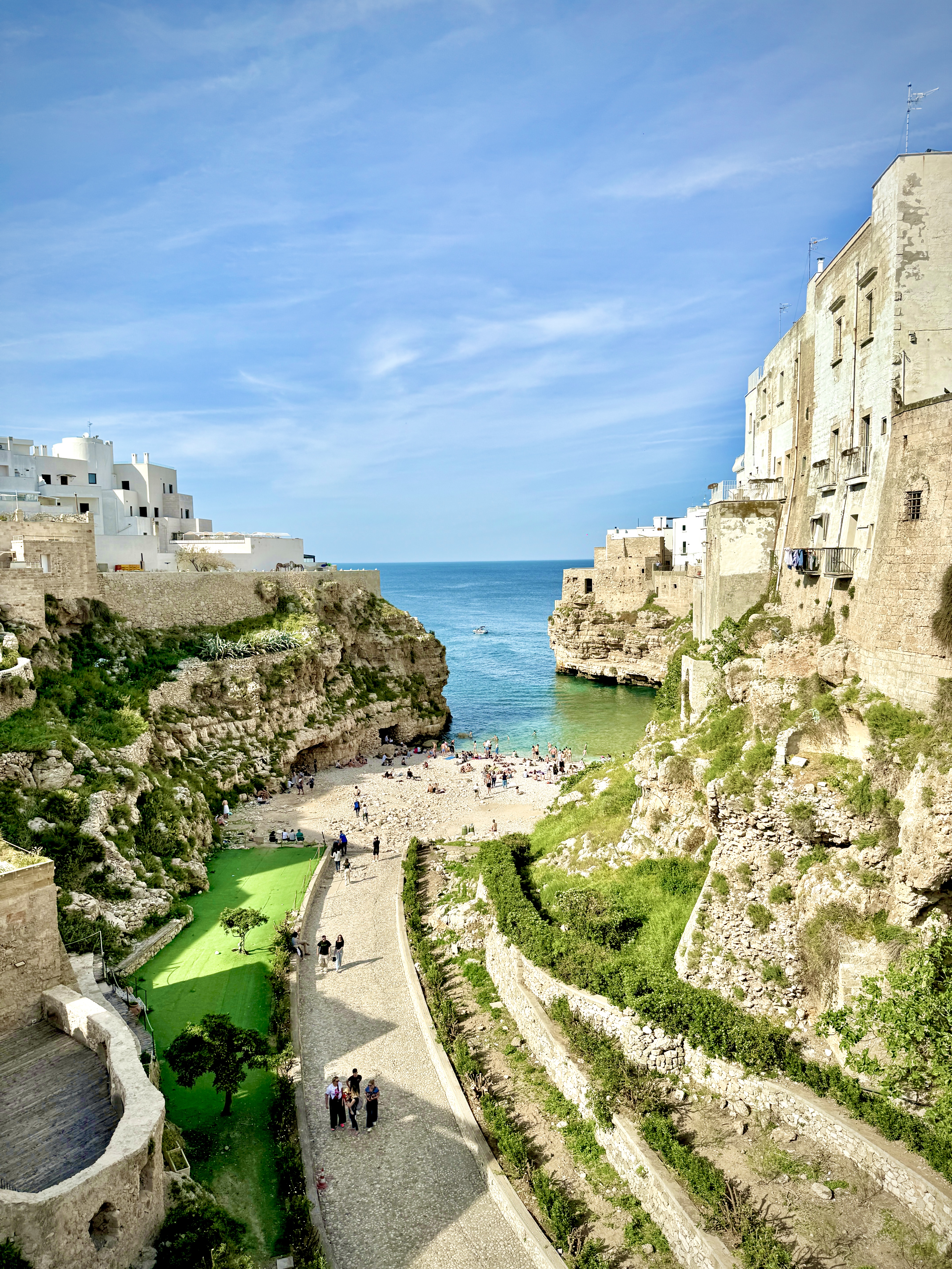 The Lama Monachile cove below the white houses of Polignano a Mare, Puglia
